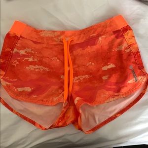 Reebok running shorts, “speed wick” like material.